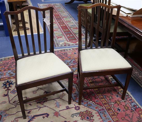 A set of six George III mahogany dining chairs